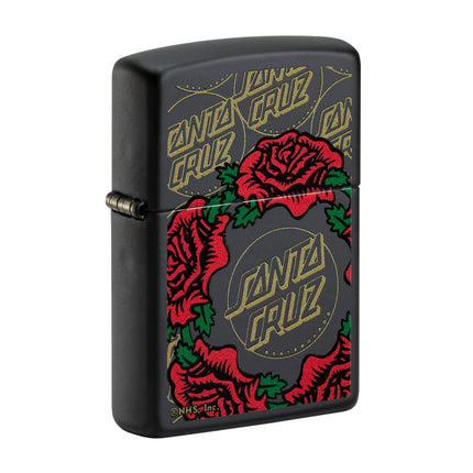 Front view of a Black Matte Zippo lighter featuring the Santa Cruz Skateboards logo in gold, surrounded by a detailed wreath of red roses and green leaves.